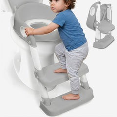 Child using a step stool to climb onto a toilet