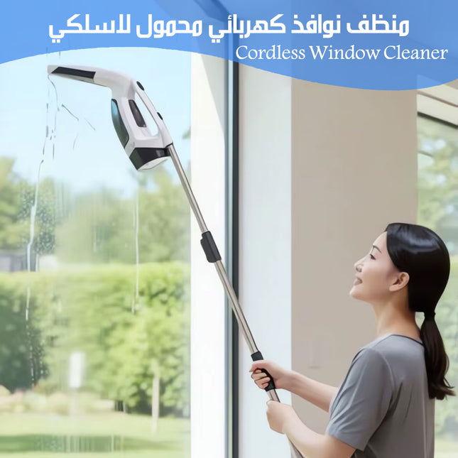 A cordless window cleaner being used by a woman to clean a tall window. The cleaner has a white and black body with a long silver metal pole.