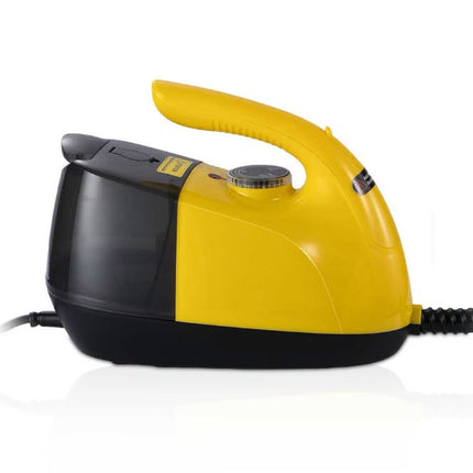 Yellow and black steam iron on a white background with a reflection.