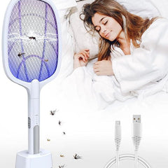 Woman sleeping in bed with a fly swatter and USB cable on a white background
