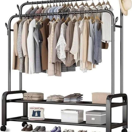 Clothing rack with clothes and shelves on a white background
