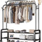 Clothing rack with clothes and shelves on a white background