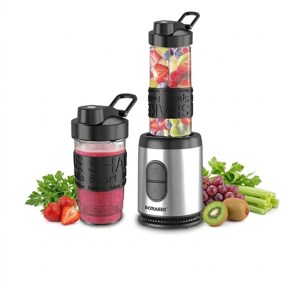 Personal blender with fruits and vegetables on a white background