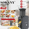 Sokany 6-in-1 salad maker SK-03087 in dark gray, shown alongside its retail box, loose yellow cheese cubes, and feature callouts for copper motor, 150W power, and versatility. The background features a softly blurred lifestyle scene of a person preparing food.